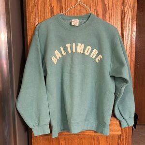 Like-new women’s crewneck sweatshirt, small, BALTIMORE embroidered on front